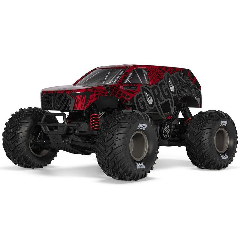 Remote control off-road monster truck with oversized tires, red and black body, and rugged suspension for extreme outdoor racing.