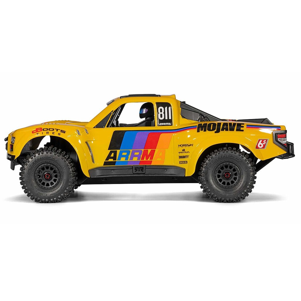 Yellow RC off-road racing truck with large tires, racing decals, and the number 81, designed for remote control car enthusiasts.