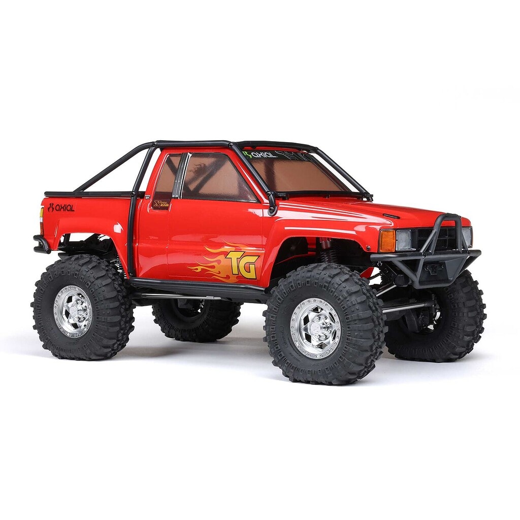 RC Newb Axial SCX10 III 1987 Toyota SR5 RC trail truck with detailed design and off-road capabilities. Perfect for RC enthusiasts and collectors interested in scale trail vehicles.