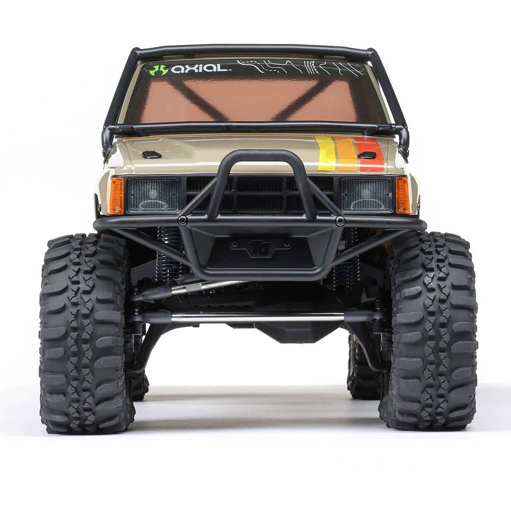 AXIAL SCX10 III 1987 Toyota SR5 RTR off-road RC truck with rugged tires and detailed body. Perfect for trail and rock crawling adventures.