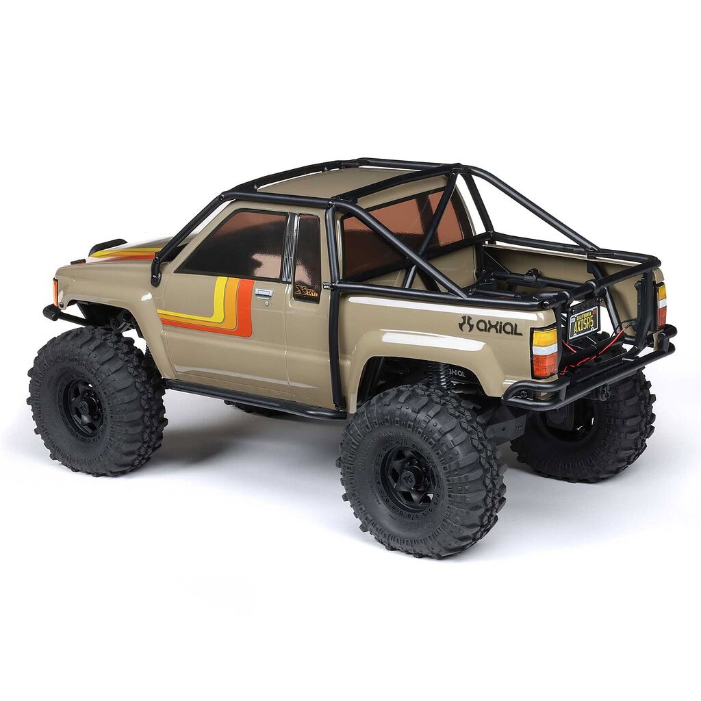 High-quality Axial SCX10 III 1987 Toyota SR5 RTR trail truck with detailed scale design and rugged off-road tires. Perfect for RC enthusiasts and trail adventures.
