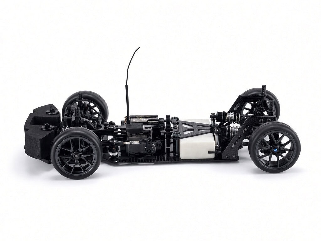 RC Carisma M40F FWD mid-motor on-road chassis kit with detailed suspension and drivetrain components for RC racing.