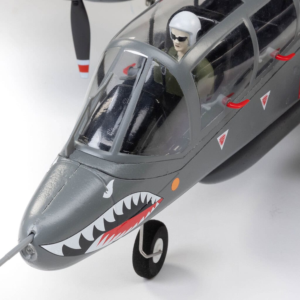Detailed RC fighter jet model with pilot figure, shark mouth design, and realistic features for remote control enthusiasts.