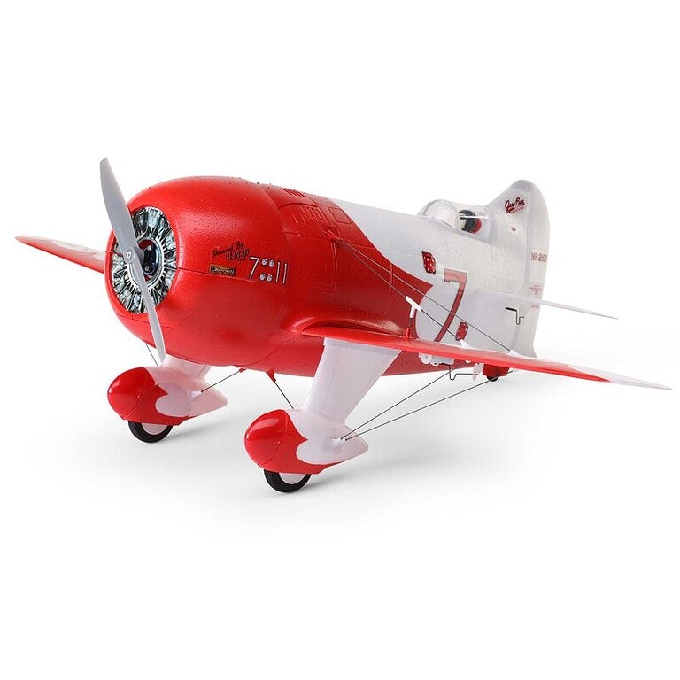 Miniature RC airplane model of the classic Gee Bee R-2 with detailed design and vibrant red and white color scheme. Perfect for hobbyists and RC aircraft enthusiasts.
