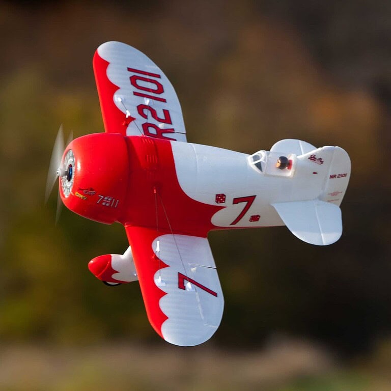 Flite UMX Gee Bee R-2 510mm BNF RC airplane in red and white, designed for aerobatic flying and scale appearance. Perfect for hobbyists seeking precision and agility.