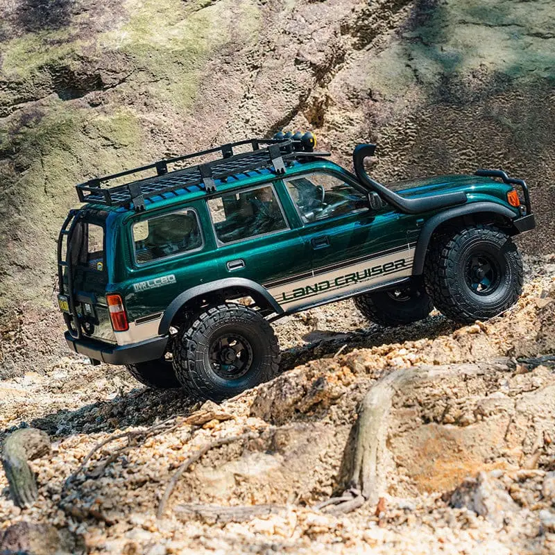 RC Land Cruiser off-road model with brushless motor, detailed scale design, and rugged tires for tough terrain. Perfect for RC enthusiasts and collectors.