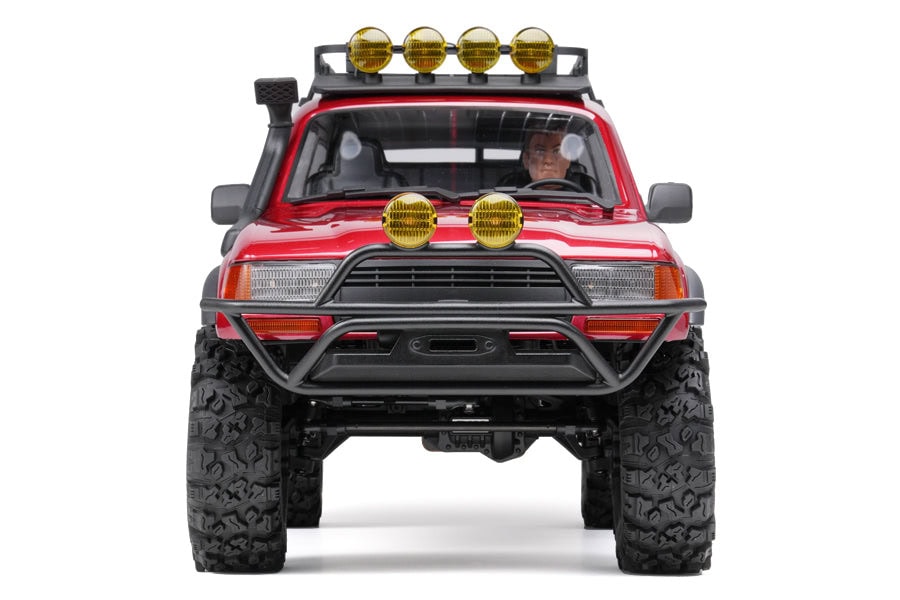 RC off-road vehicle with rugged tires, LED light bar, and detailed exterior, designed for remote control enthusiasts and off-road racing fans.