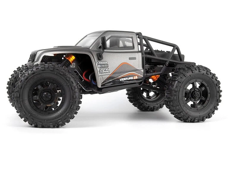 High-performance RC off-road monster truck with large tires, durable chassis, and advanced suspension for rugged terrain driving.