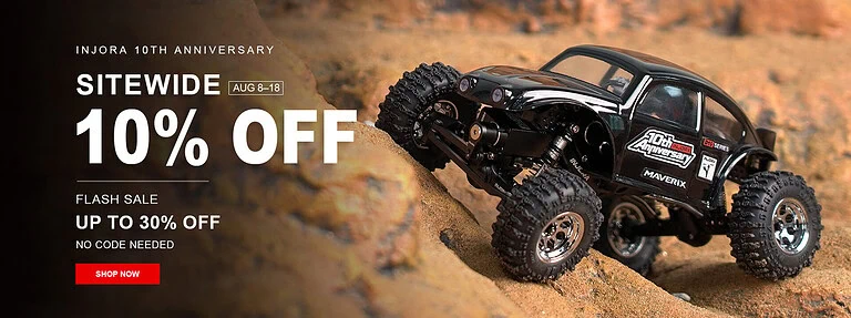 Remote control off-road vehicle navigating rocky terrain with large tires and detailed design, showcasing RC hobby equipment.