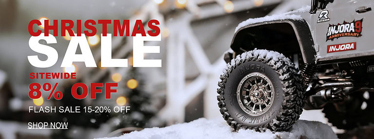 Close-up of RC off-road vehicle tire with snow.