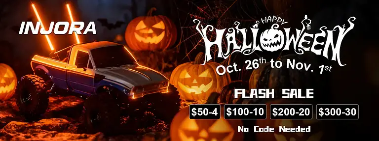RC monster truck with illuminated neon lights at Halloween themed display featuring glowing jack-o'-lanterns and spooky decorations for Halloween sale promotion.