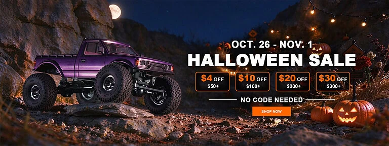 Off-road purple truck on rocky terrain under Halloween sale banners with pumpkins.