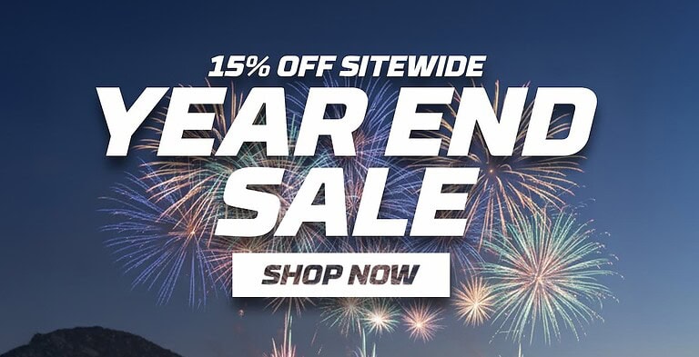 Bright fireworks display over mountain with bold text promoting year-end RC vehicle sale.