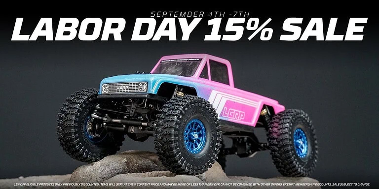 RC off-road vehicle with large tires and pink and blue body, promoting a 15% Labor Day sale from September 4th to 7th.