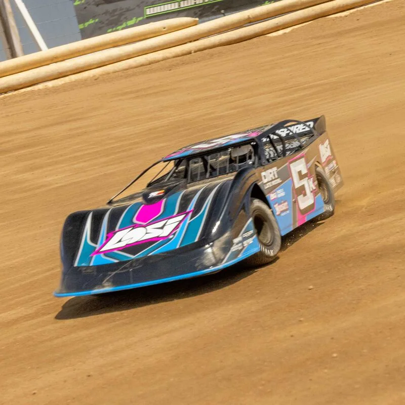 RC Newb Losi 22S 1/10 Dirt Late Model racing on dirt track, showcasing high-speed RC car performance and detailed design.