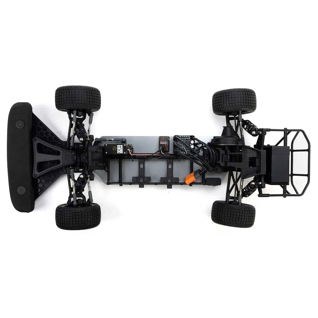 Top view of the Losi 22S 1/10 Dirt Late Model RC race car chassis showing wheels, suspension, and electronic components.