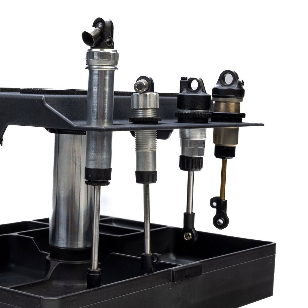 High-quality Pro-Line PRO car stand featuring adjustable toppers for 1/28 to 1/8 scale RC cars, ideal for maintenance and display.