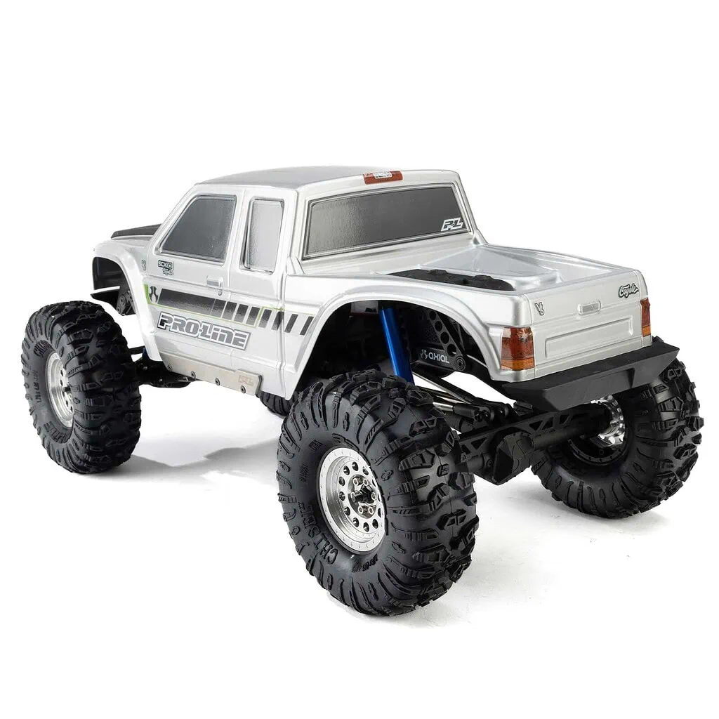 Detailed image of a white off-road RC truck with large tires and suspension, suitable for rugged terrain and RC car enthusiasts.