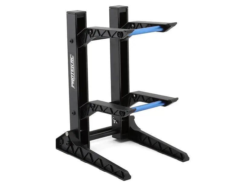Durable adjustable RC car stand for easy maintenance, repairs, and setup of remote control cars. Perfect for hobbyists and RC enthusiasts.