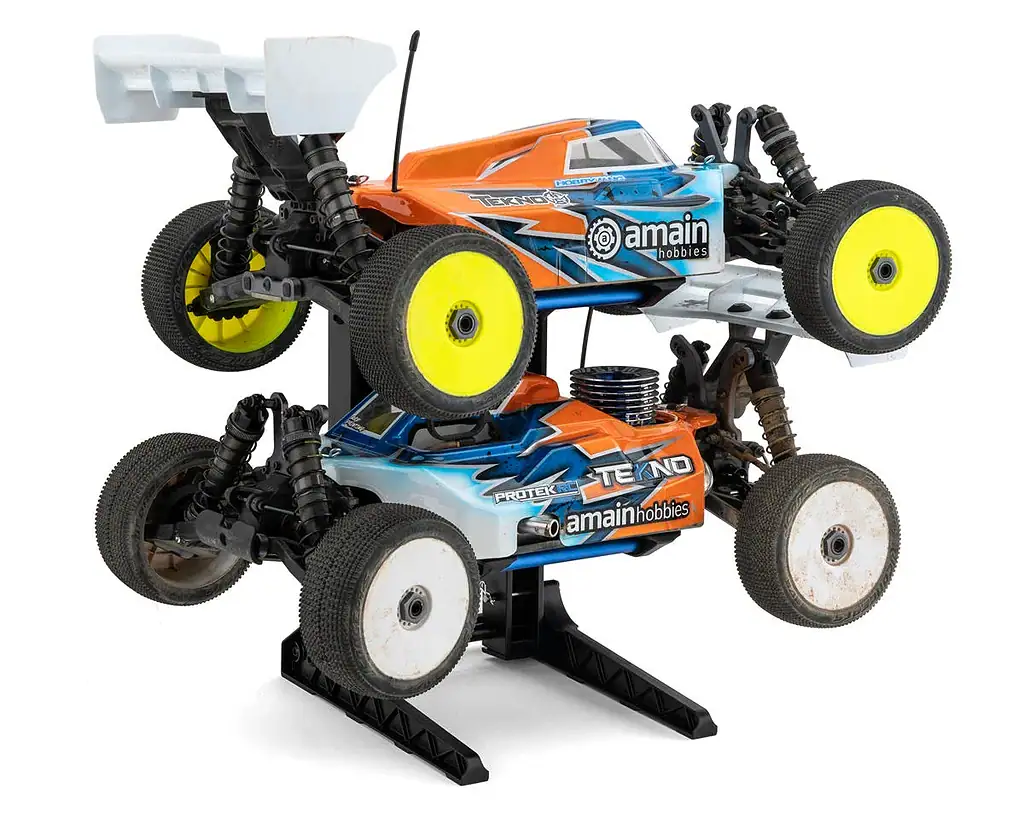 High-performance RC car with durable chassis, bright yellow wheels, and advanced suspension system, ideal for off-road RC racing and hobby enthusiasts.