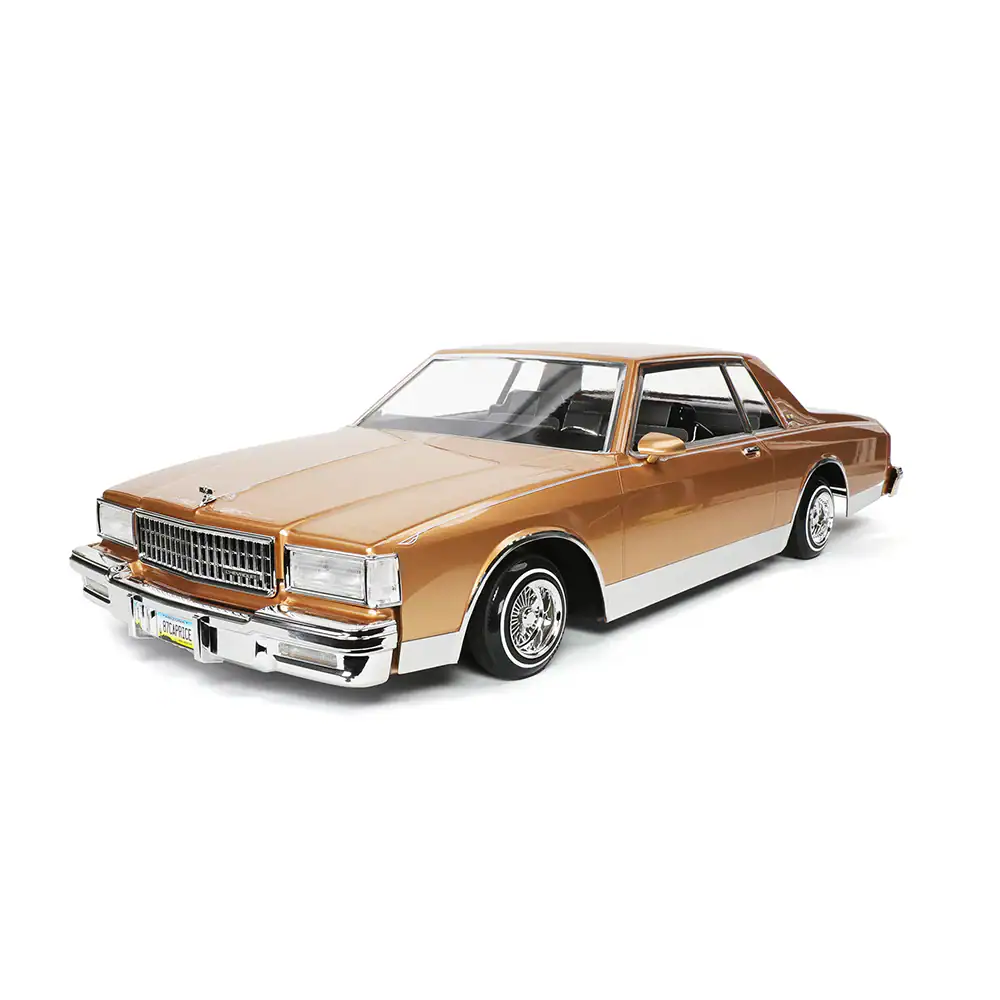 Classic vintage 1970s brown and white luxury car, detailed model featuring authentic design and chrome accents. Ideal for RC car enthusiasts and collectors.