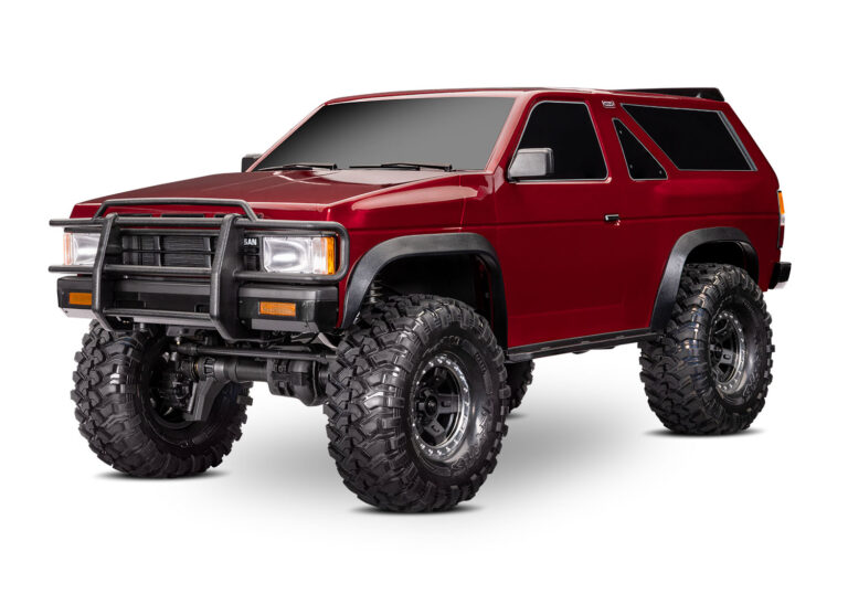 Off-road RC vehicle with large tires, rugged design, and red body, ideal for remote control car enthusiasts and hobbyists, suitable for trail adventures and outdoor fun.
