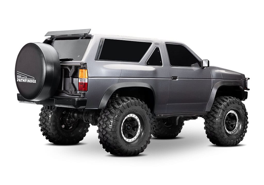RCCrawler off-road remote control vehicle Nissan Pathfinder with large tires and rugged suspension for off-road adventures and RC hobby enthusiasts.